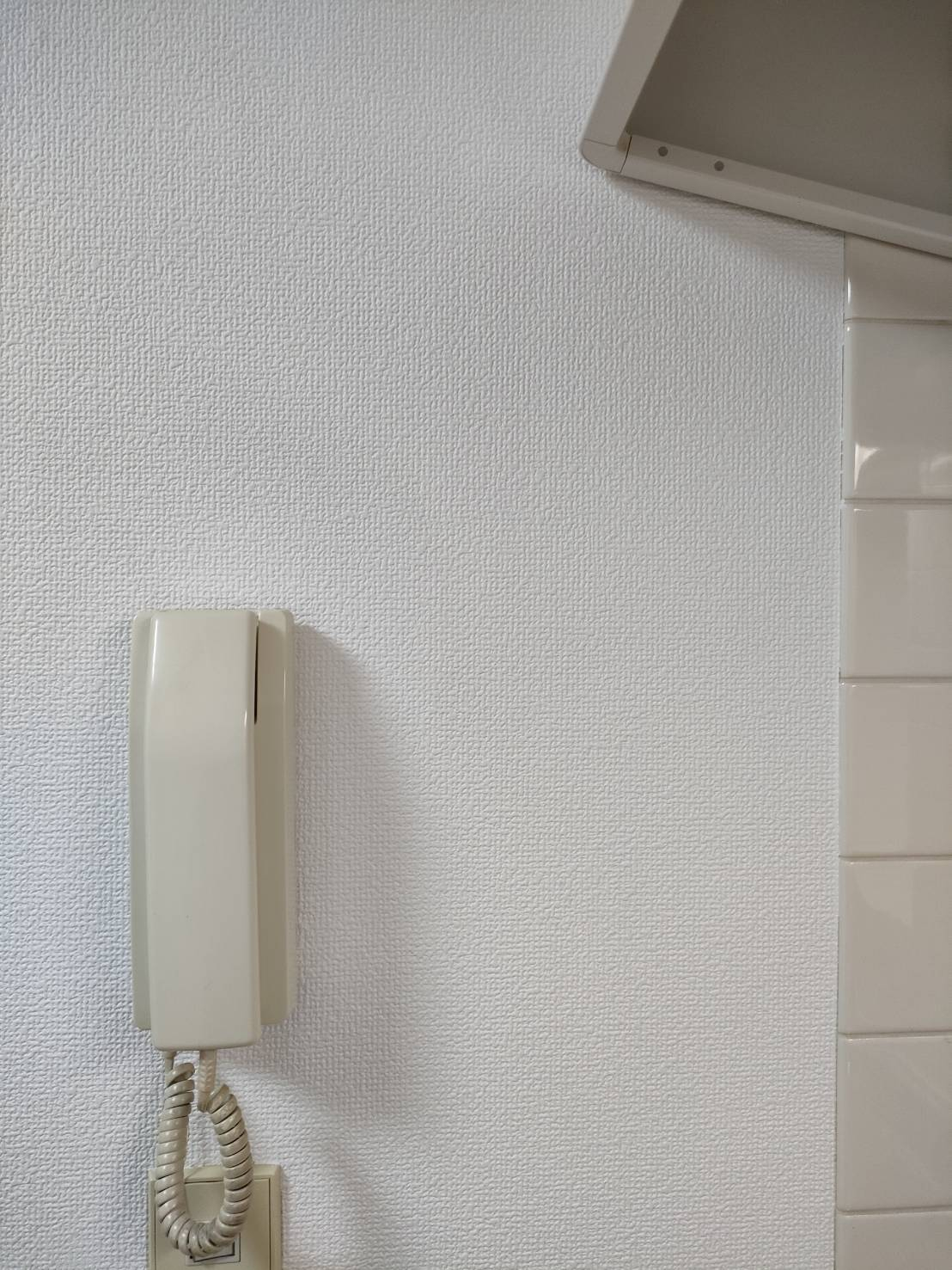 大分県大分市の壁紙復元塗装の作業後1