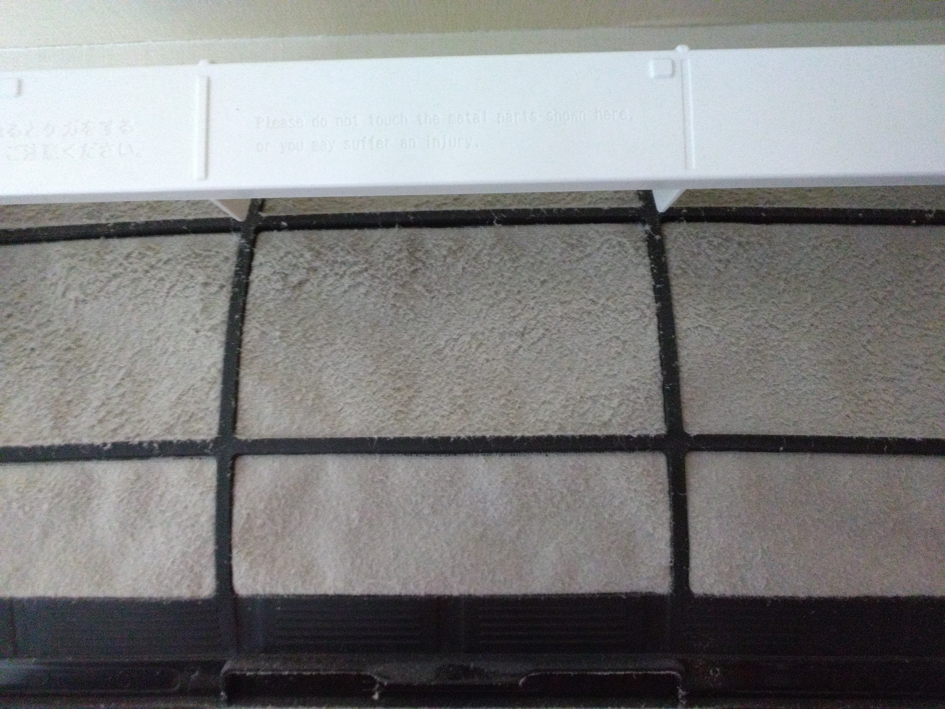 青森県八戸市の壁掛けエアコンの作業前1