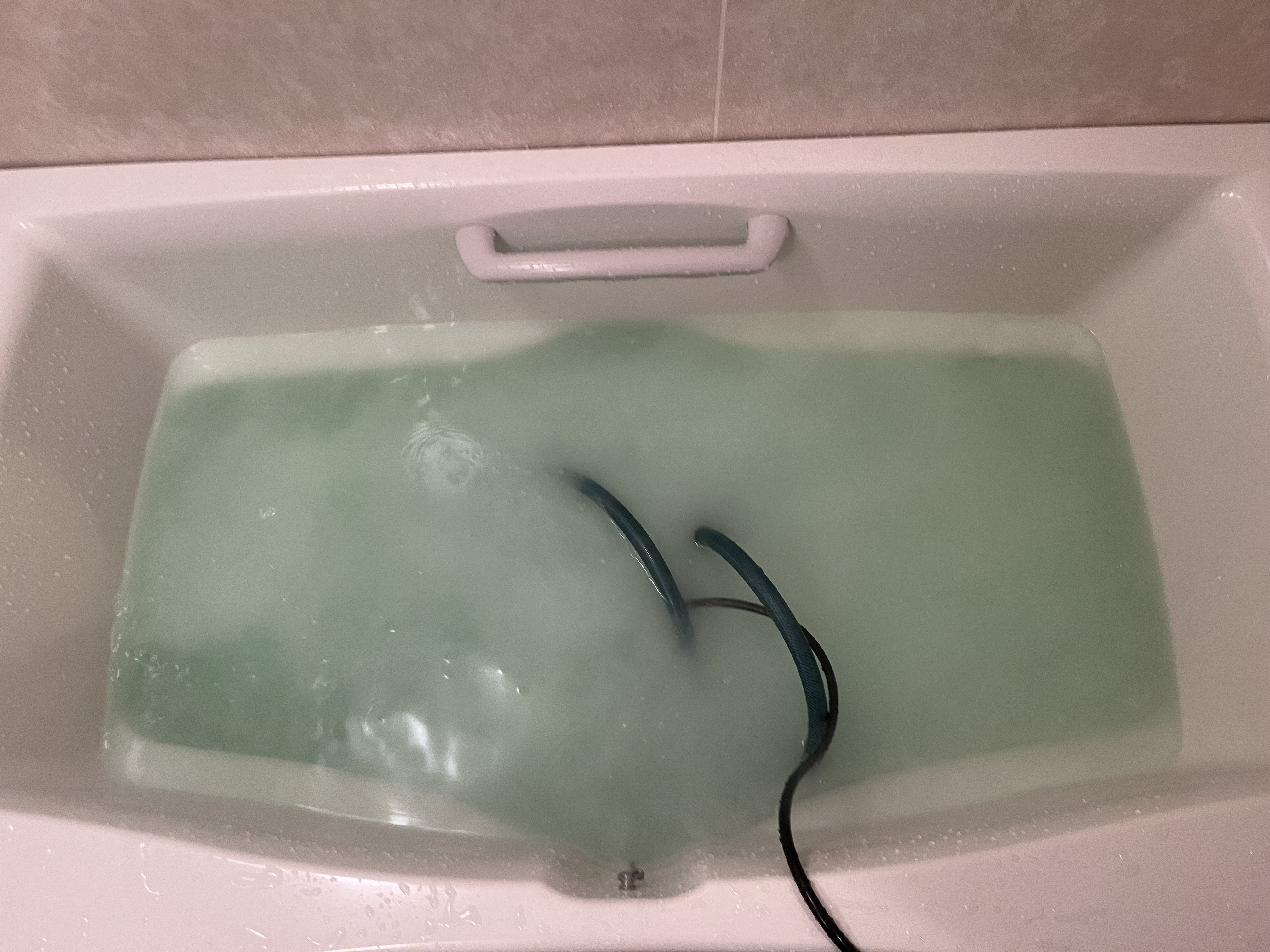 青森県弘前市南横町の追い焚き配管除菌洗浄の作業前1